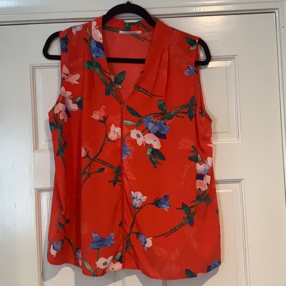 Red floral blouse